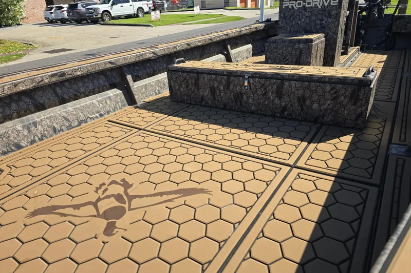 Slide: The Image of Pro-Drive 2272 boat interior with hexagonal pattern flooring, 2026 model. - 10