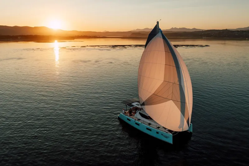 Slide: The Image of Sailing yacht Vision 444 at sunset on calm waters, 2025 model. - 10