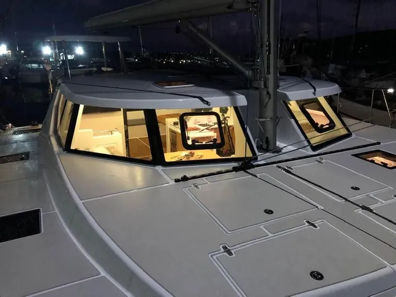 Slide: The Image of Modern Vision 444 yacht at night, illuminated interior, 2025 model. - 20