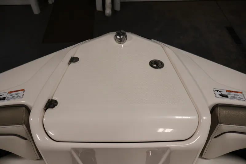 Slide: The Image of Bow storage compartment on a 2017 Yamaha Boats 212 Limited S. - 12