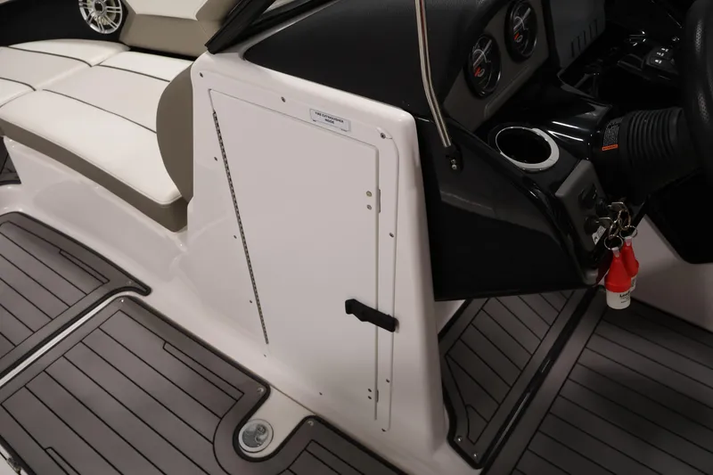 Slide: The Image of 2017 Yamaha Boats 212 Limited S interior with seating and dashboard details. - 17