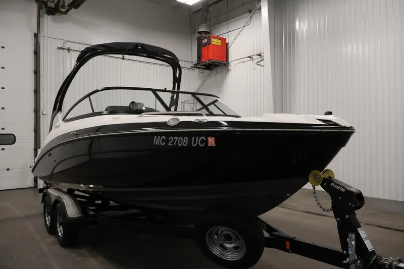 Slide: The Image of 2017 Yamaha Boats 212 Limited S on trailer in indoor storage facility. - 3