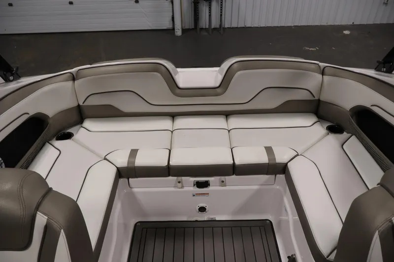 Slide: The Image of Interior seating of 2017 Yamaha Boats 212 Limited S, featuring plush, beige upholstery. - 36