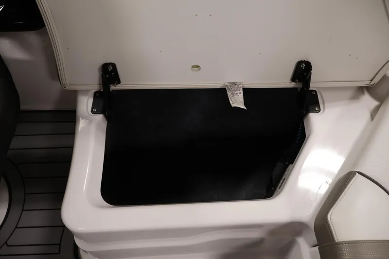 Slide: The Image of Open storage compartment in 2017 Yamaha Boats 212 Limited S. - 39