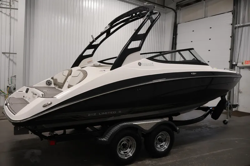 Slide: The Image of 2017 Yamaha Boats 212 Limited S on trailer in indoor storage facility. - 4