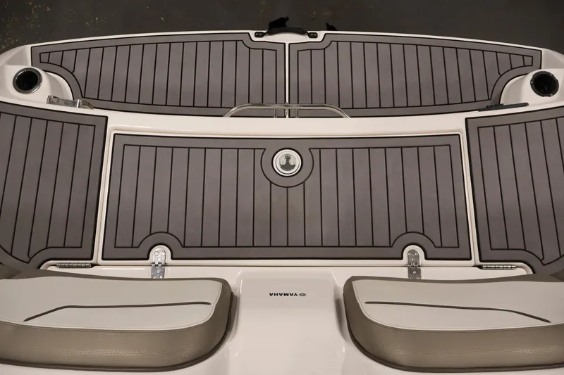 Slide: The Image of 2017 Yamaha Boats 212 Limited S swim platform with gray decking and seating. - 40