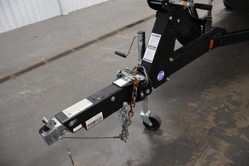 Slide: The Image of Trailer hitch of a 2017 Yamaha Boats 212 Limited S in a garage setting. - 45