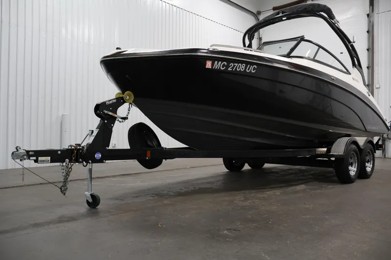 Slide: The Image of 2017 Yamaha Boats 212 Limited S on trailer in indoor storage facility. - 47