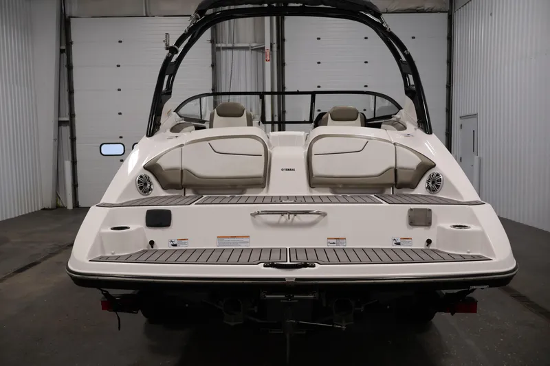 Slide: The Image of 2017 Yamaha Boats 212 Limited S, rear view in indoor storage facility. - 6