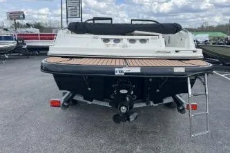 Slide: The Image of 2017 Bayliner 195 Deck Boat, rear view with swim platform and ladder. - 5