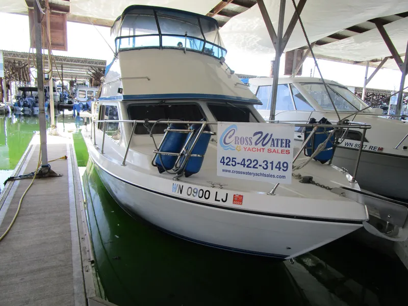 The Image of 1988 Commander 26 yacht docked with for sale sign. - 1