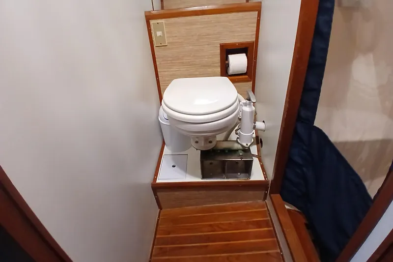 Slide: The Image of Compact marine toilet in 1985 Kadey-Krogen 38 yacht bathroom. - 37
