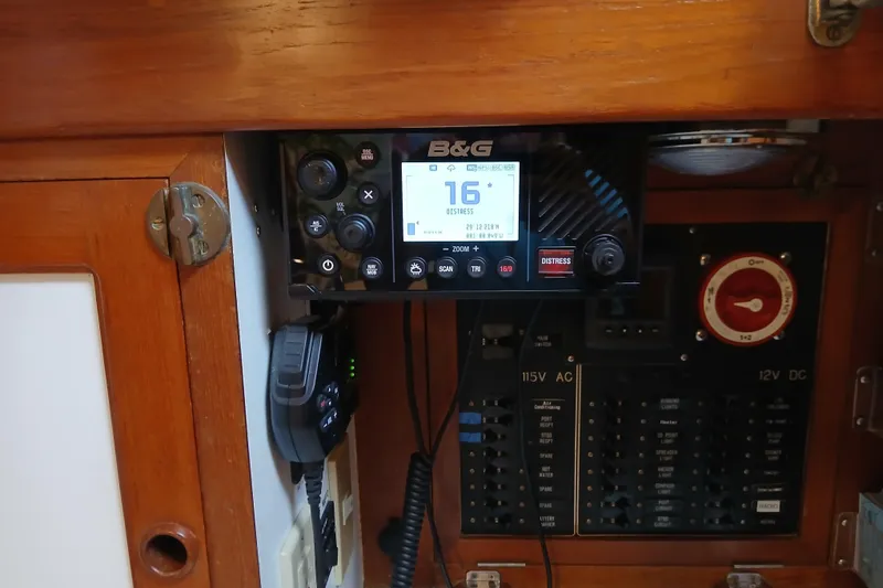 Slide: The Image of B&G marine radio and control panel inside 1985 Kadey-Krogen 38 yacht. - 52