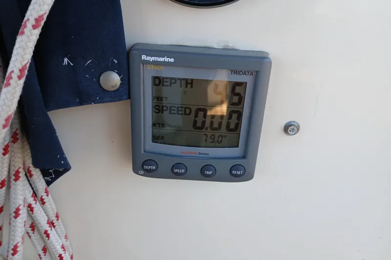 Slide: The Image of Raymarine ST60+ display on 1985 Kadey-Krogen 38, showing depth and speed readings. - 55