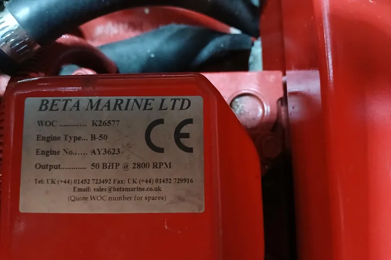 Slide: The Image of Beta Marine engine label on a 1985 Kadey-Krogen 38, showing specifications and contact details. - 60