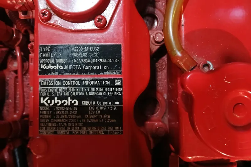 Slide: The Image of Close-up of Kubota engine label on a 1985 Kadey-Krogen 38 boat. - 61