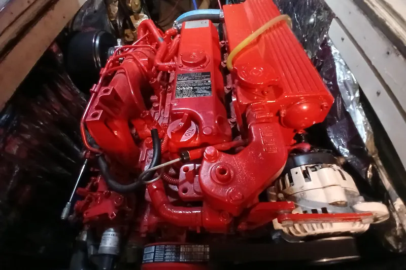 Slide: The Image of Red engine of a 1985 Kadey-Krogen 38 boat, detailed view. - 62