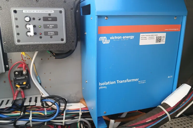 Slide: The Image of Electrical panel and Victron Energy isolation transformer on a 1985 Kadey-Krogen 38 boat. - 64