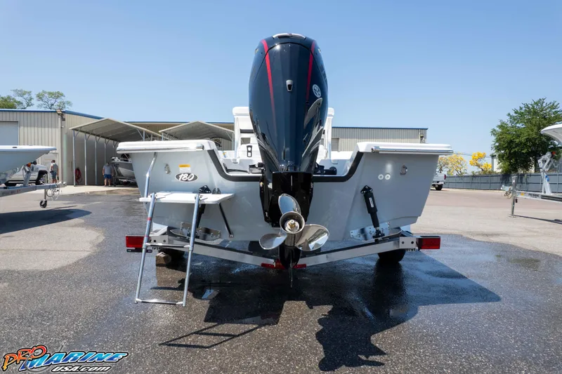 Slide: The Image of Rear view of a 2026 Frontier 180 boat with outboard motor and ladder. - 13