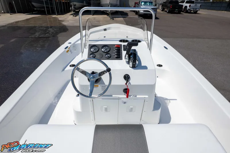Slide: The Image of 2026 Frontier 180 boat dashboard with steering wheel and control panel. - 22