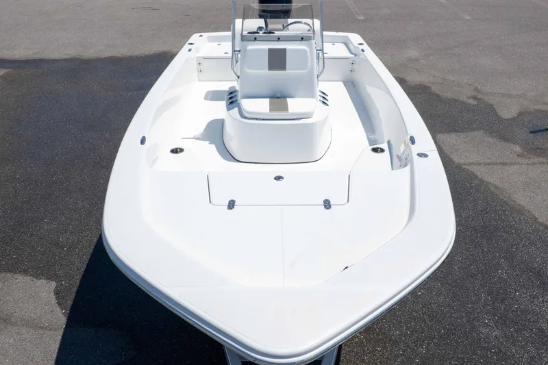 Slide: The Image of 2026 Frontier 180 boat, top view, showcasing sleek white deck design. - 6