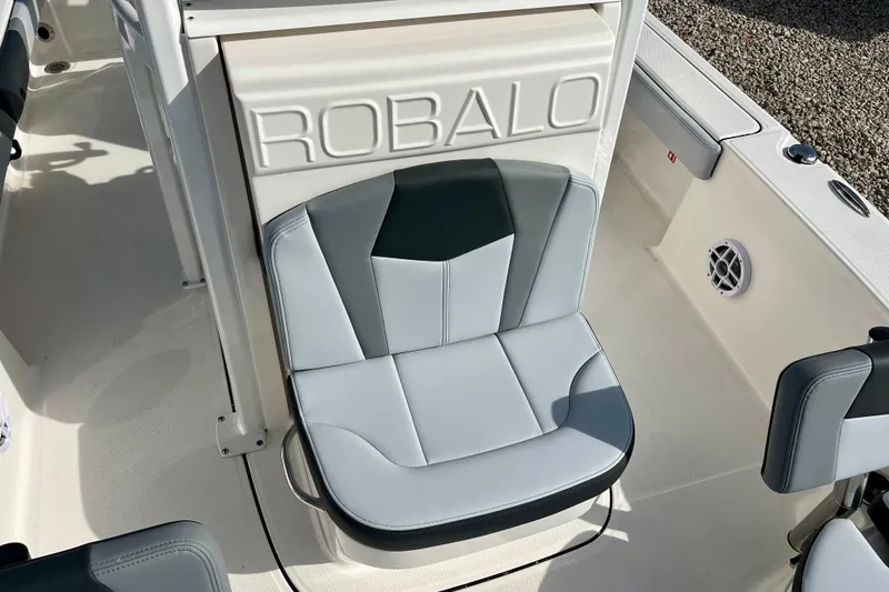Slide: The Image of 2026 Robalo 226 Cayman boat seat with stylish gray and white upholstery. - 19