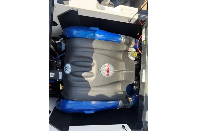 Slide: The Image of Engine compartment of a 2018 MasterCraft XT22 boat with Ilmor engine. - 18
