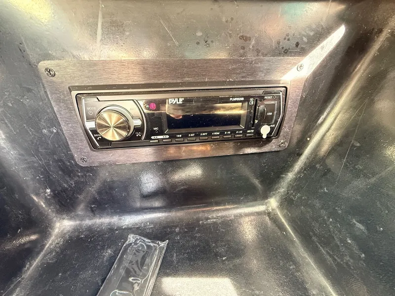 Slide: The Image of Pyle car stereo in a 2003 Regal 2000 Bowrider boat. - 14
