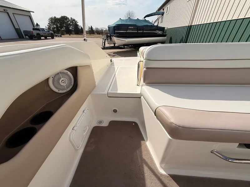 Slide: The Image of Interior of a 2003 Regal 2000 Bowrider boat with seating area. - 20