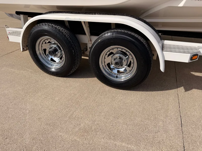 Slide: The Image of Trailer tires of a 2003 Regal 2000 Bowrider boat. - 28