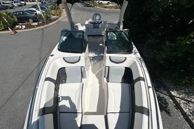 Slide: The Image of 2023 Chaparral 270 OSX boat with sleek design and spacious seating. - 15