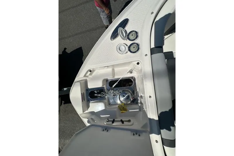 Slide: The Image of 2023 Chaparral 270 OSX boat deck with winch and controls. - 16