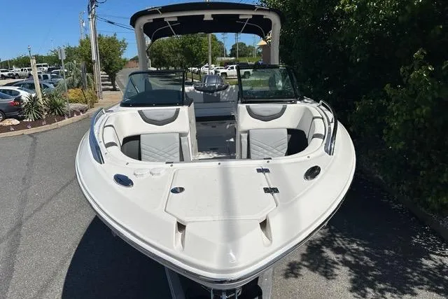 Slide: The Image of 2023 Chaparral 270 OSX boat with sleek design, spacious seating, and modern features. - 9