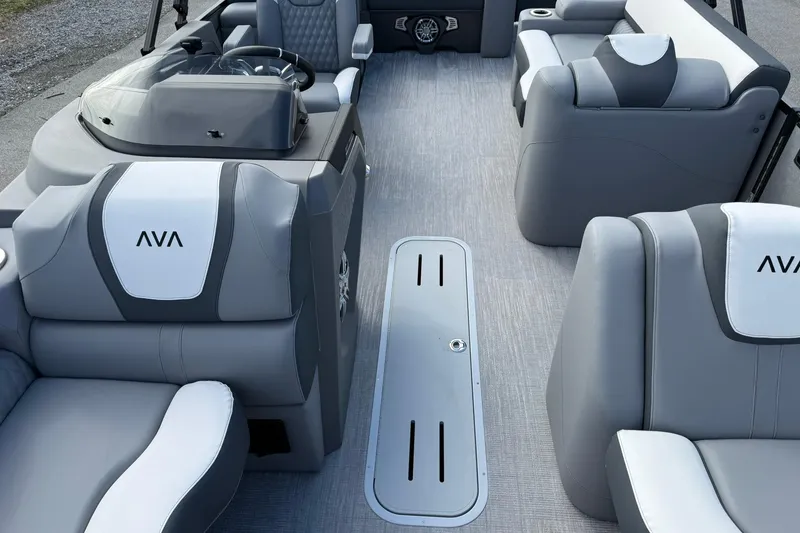Slide: The Image of 2026 Avalon Catalina Elite 23 interior with luxurious gray seating and modern design. - 10