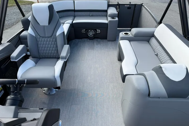 Slide: The Image of Luxurious interior of 2026 Avalon Catalina Elite 23 pontoon boat with plush seating. - 12