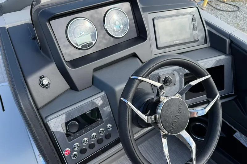 Slide: The Image of Dashboard of 2026 Avalon Catalina Elite 23 with steering wheel and gauges. - 15