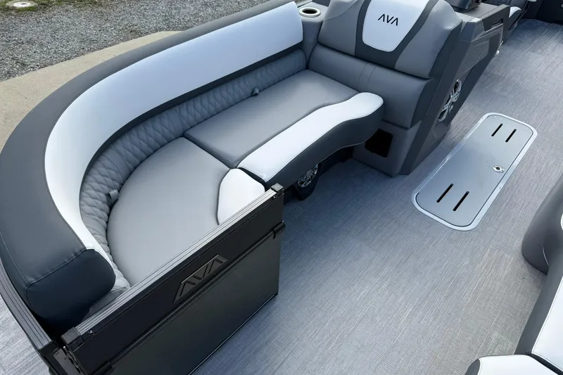 Slide: The Image of Luxurious seating on 2026 Avalon Catalina Elite 23 pontoon boat, featuring sleek gray and white upholstery. - 9