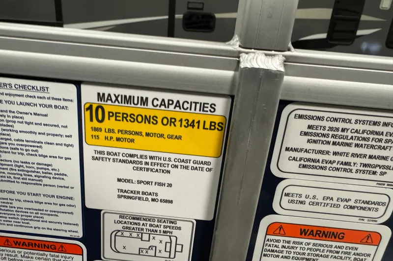 Slide: The Image of Maximum capacity label on 2026 Sun Tracker SportFish 20 DLX boat, 10 persons or 1341 lbs. - 16