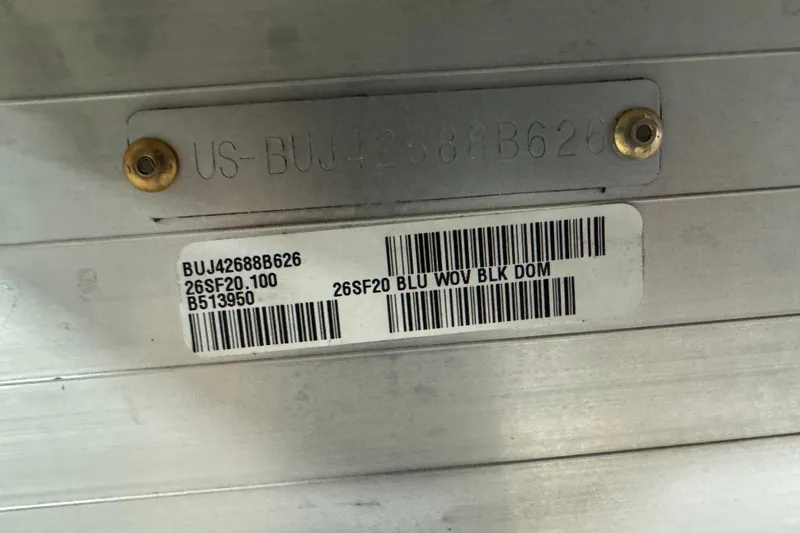 Slide: The Image of Hull identification number and barcode on a 2026 Sun Tracker SportFish 20 DLX boat. - 5