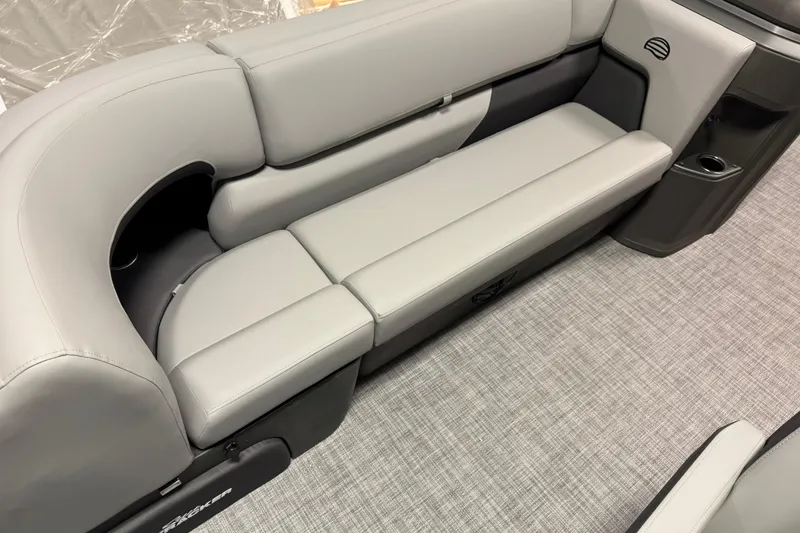 Slide: The Image of 2026 Sun Tracker SportFish 20 DLX boat interior with gray cushioned seating. - 6