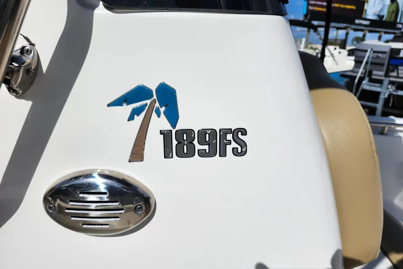 Slide: The Image of 2019 Key West 189 FS boat logo with palm tree design. - 16