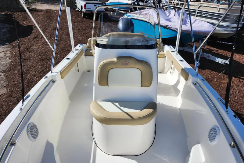 Slide: The Image of 2019 Key West 189 FS boat interior with seating and steering console. - 21