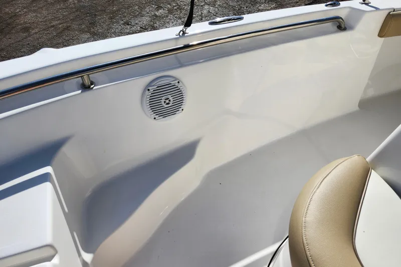 Slide: The Image of Interior of a 2019 Key West 189 FS boat, featuring seating and a speaker. - 25