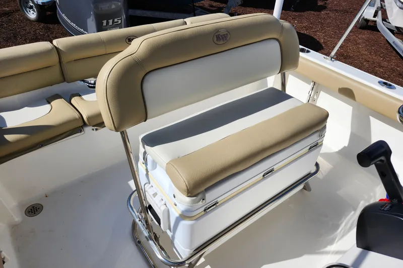 Slide: The Image of 2019 Key West 189 FS boat interior with cushioned seating and storage. - 32