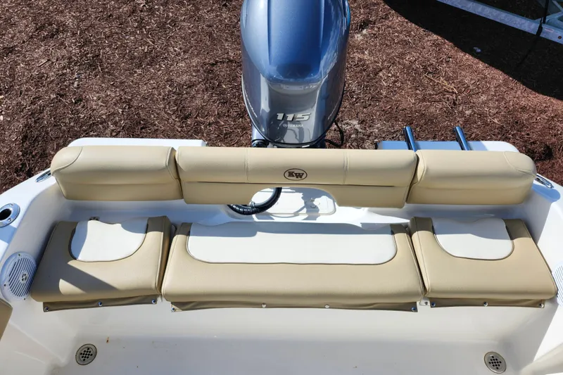 Slide: The Image of 2019 Key West 189 FS boat with beige seating and Yamaha 115 engine. - 33