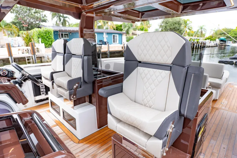 Slide: The Image of Luxurious seating on 2024 Fjord 41 XP yacht with elegant design and waterfront view. - 13