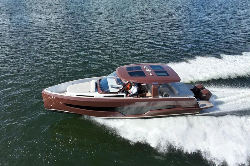Slide: The Image of 2024 Fjord 41 XP luxury yacht cruising on open water, showcasing sleek design and performance. - 1