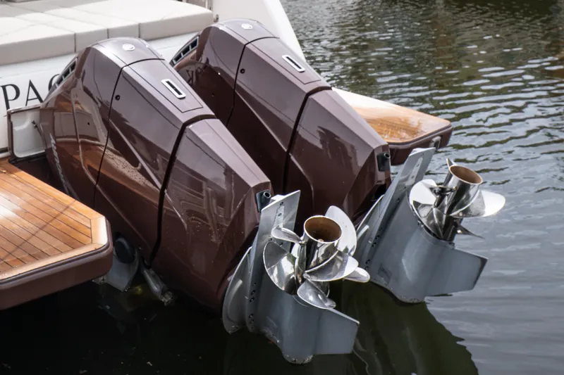 Slide: The Image of 2024 Fjord 41 XP boat with dual outboard engines on water. - 3