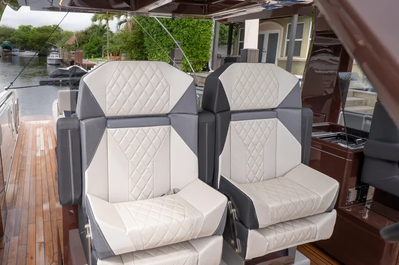 Slide: The Image of Luxurious seating on 2024 Fjord 41 XP yacht with elegant diamond stitching. - 11