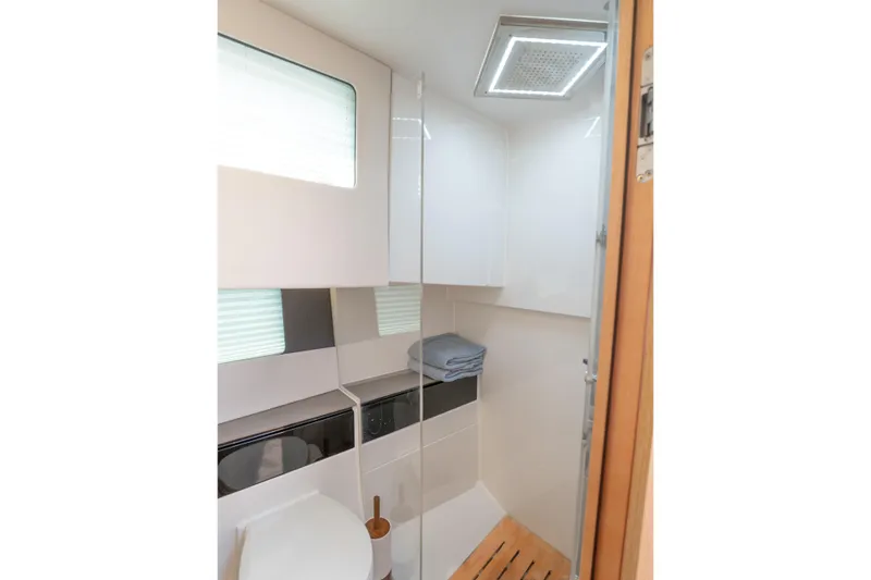 Slide: The Image of Modern bathroom interior of 2024 Fjord 41 XP yacht with sleek design and natural lighting. - 27